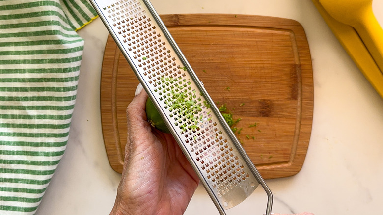 hand zesting lime