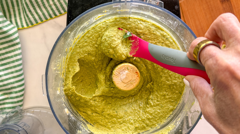 spatula of blended hummus