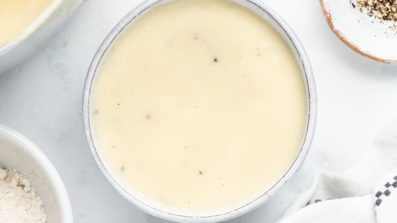 white sauce in gravy boat