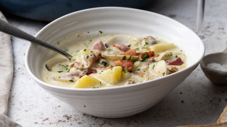 clam chowder in white bowl