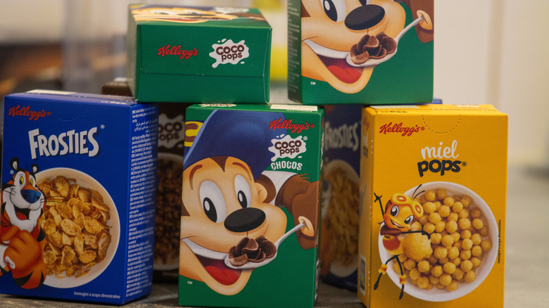 Several cereal boxes placed on a kitchen counter