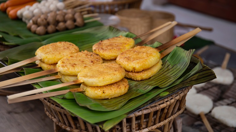 skewered grilled sticky rice patties