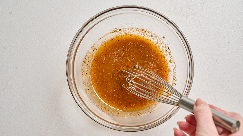 butter and seasonings stirred together in a bowl
