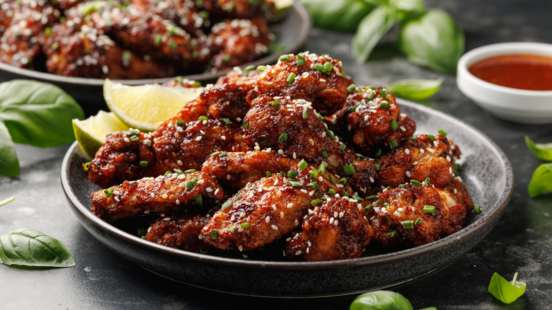 fried Koean chicken wings tossed in sauce