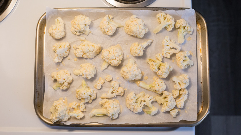 cauliflower florets on baking sheet