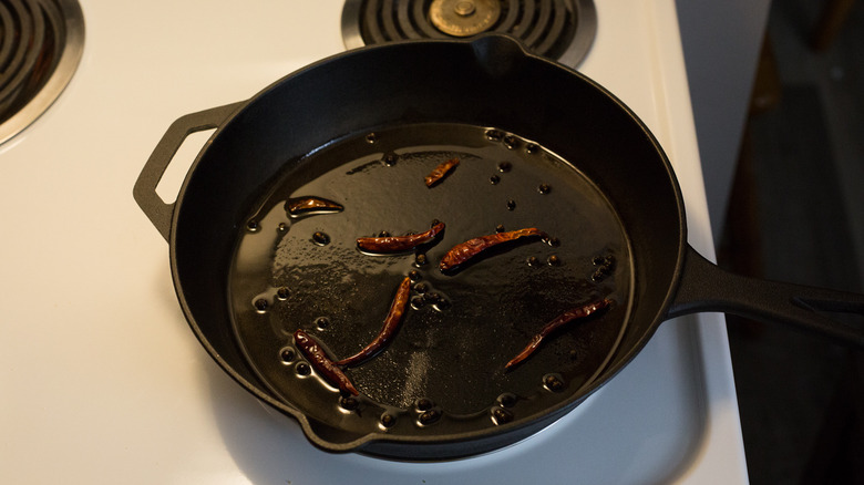 chile peppers in iron skillet