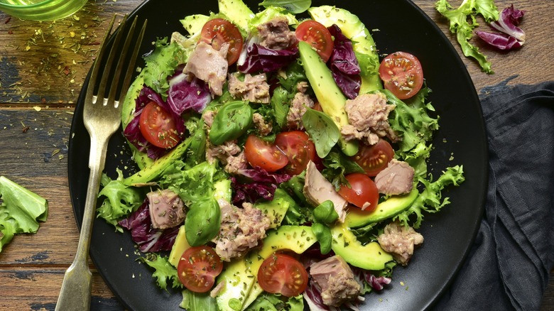Close-up of a bowl of tuna salad from above