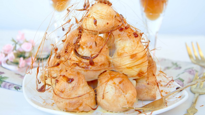 Stacked croquembouche on a plate
