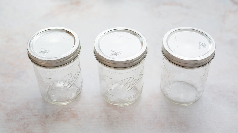 3 jars on marble table