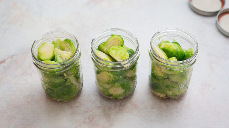 Brussels sprouts in canning jars
