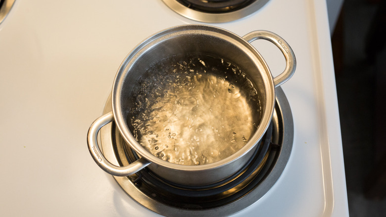vinegar simmering in small pot