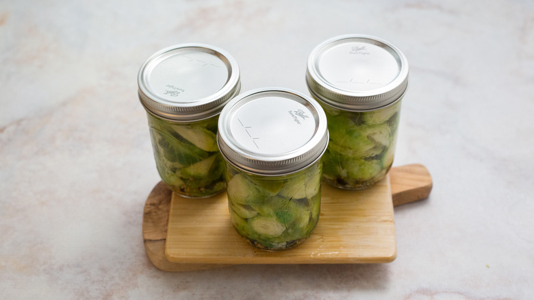 Brussels sprouts in canning jars
