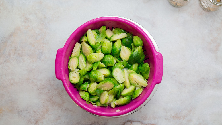 Brussels sprouts in pink colandar