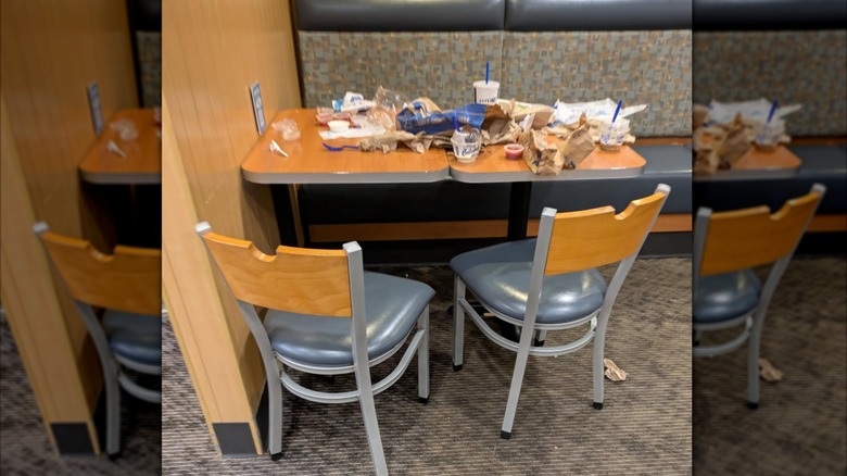 A mirrored image of a messy table at Culver's