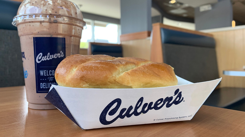 A Culver's fish sandwich and Concrete Mixer are on a table in the restaurant.