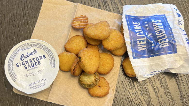 Culver's fried pickles with cup of Signature Sauce