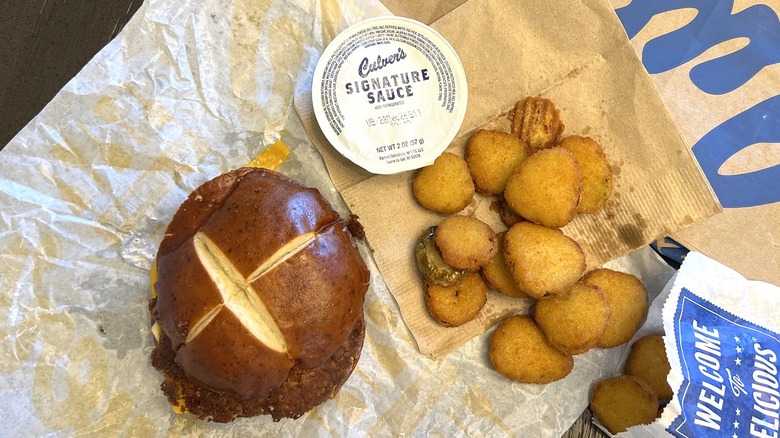 Culver's new Fried Pickle Pub Burger and fried pickles with sauce