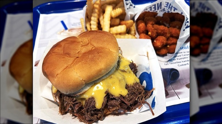 Culver's pot roast sandwich on a Kaiser bun with cheese sauce and French fries