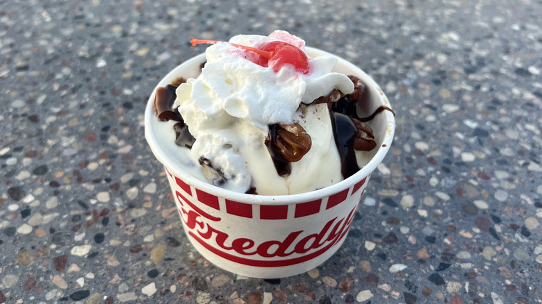Freddy's turtle sundae in paper cup.