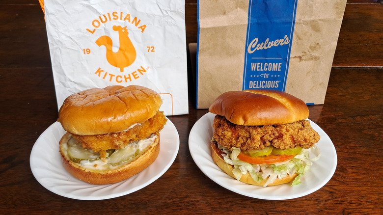 Two chicken sandwiches on plates