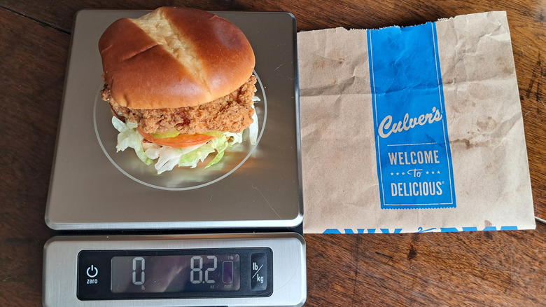 chicken sandwich on kitchen scale