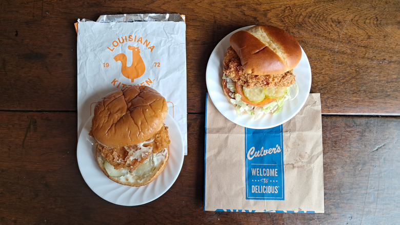 Two chicken sandwiches on plates