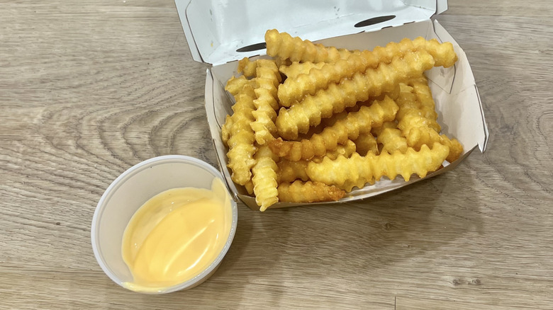 Shake Shack crinkle-cut fries with cheese sauce.