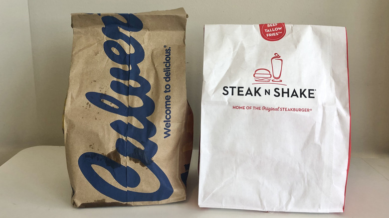 Culver's to-go bag and Steak 'n Shake to-go bag side by side