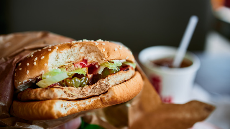 bitten handburger at fast food restaurant