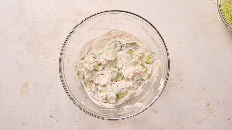 mixing raita in a bowl