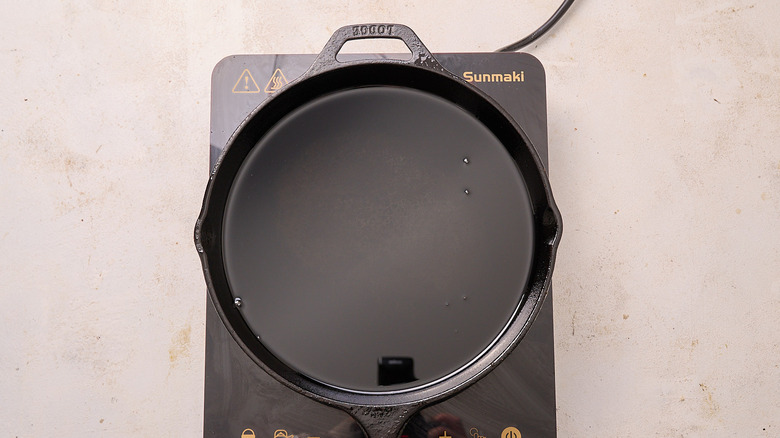 heating oil in a skillet