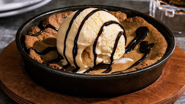 Cookie skillet with a scoop of vanilla ice cream
