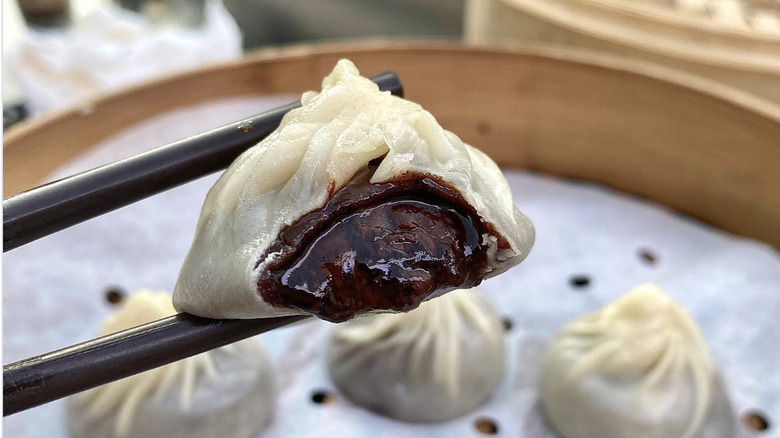 Chocolate sauce oozing out of a dumpling