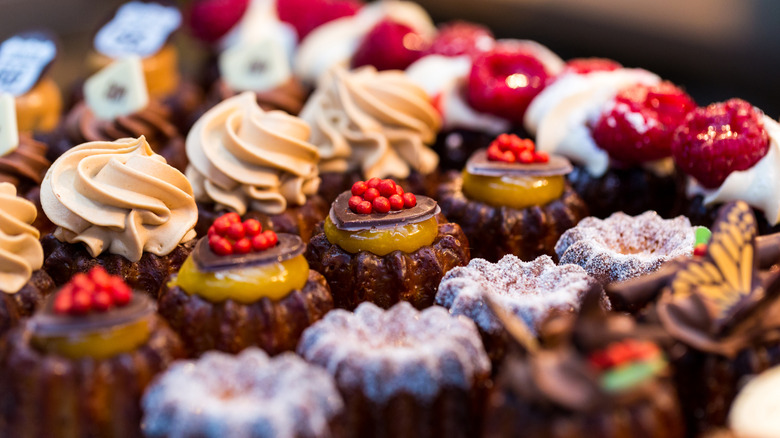 Rows of cupcakes with fun toppings