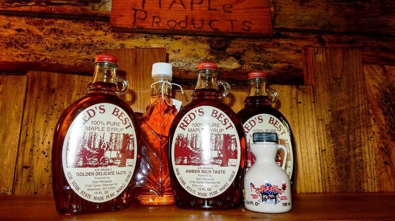 Assortment of branded maple syrup.