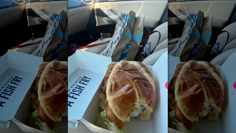 Culver's North Atlantic Cod Sandwich in fast food container on car