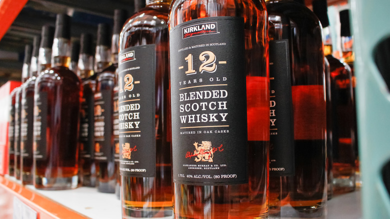 Bottles of Kirkland 12-Year blended Scotch whisky on Costco shelves