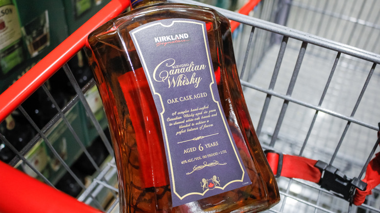 Bottle of Kirkland Canadian whisky in a cart