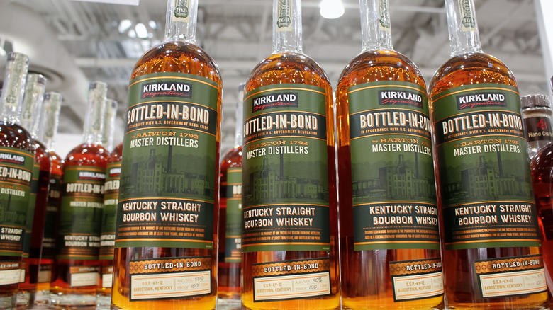 Bottles of Kirkland Bottled-in-Bond Kentucky Straight Bourbon Whiskey on Costco shelves