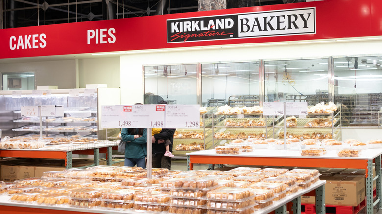 Bakery section inside Costco store featuring displays of pastries and bread
