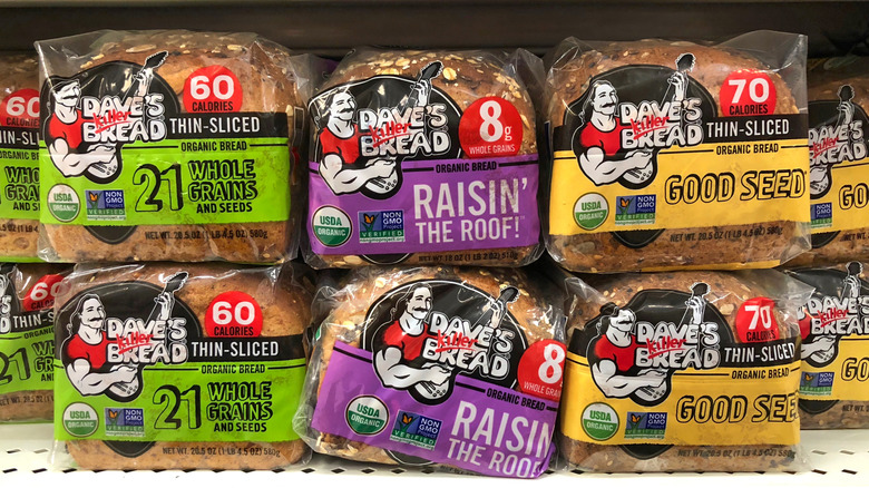 Variety of Dave's Killer Bread on a grocery store shelf