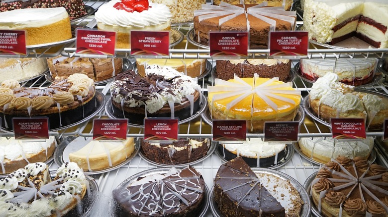 Rows of The Cheescake Factory's cheesecakes on display