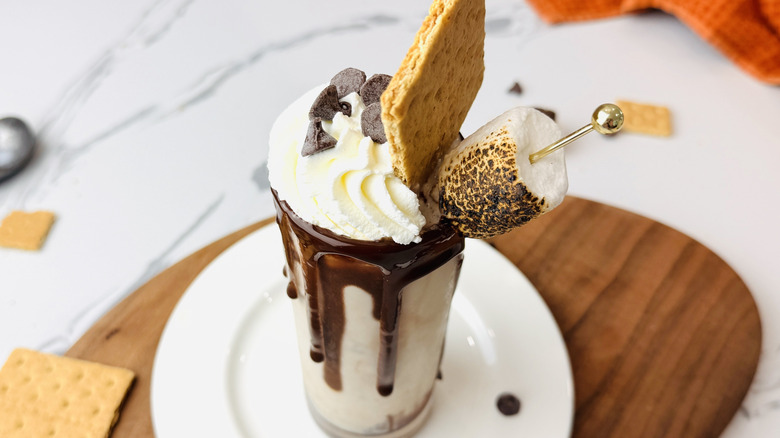 S'mores milkshake sitting on plate
