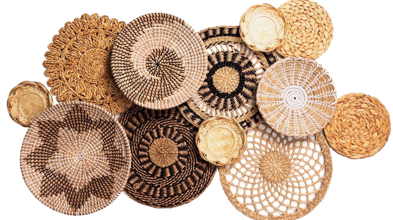 Wicker basket bases on a white background
