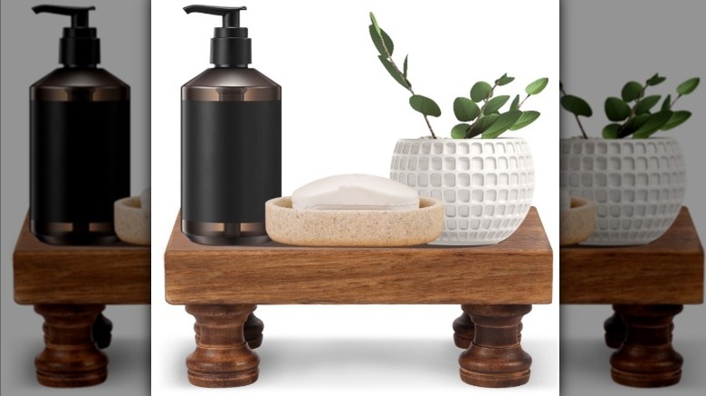 Wood stand with bathroom items on it
