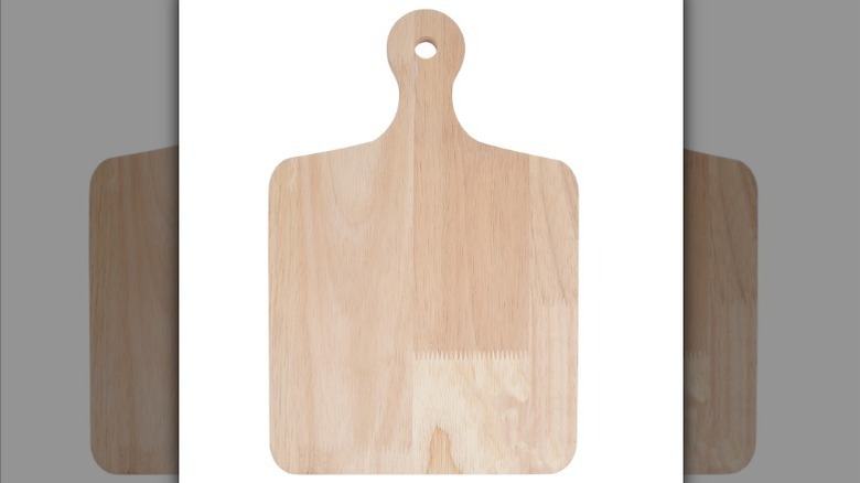Wooden tray with a handle on a white background
