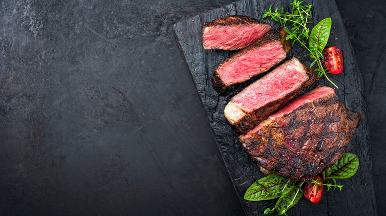 prepared sliced Delmonico steak