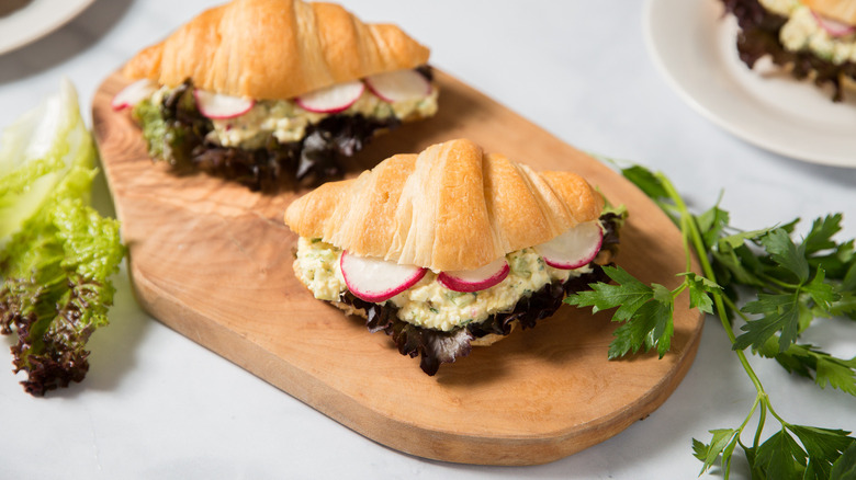 croissant egg sandwiches on table