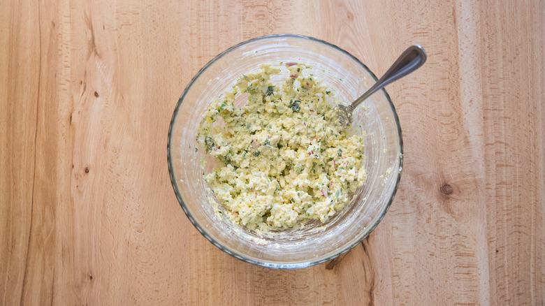 Egg salad in glass bowl