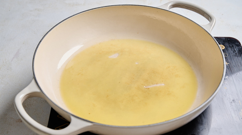heating oil in a skillet